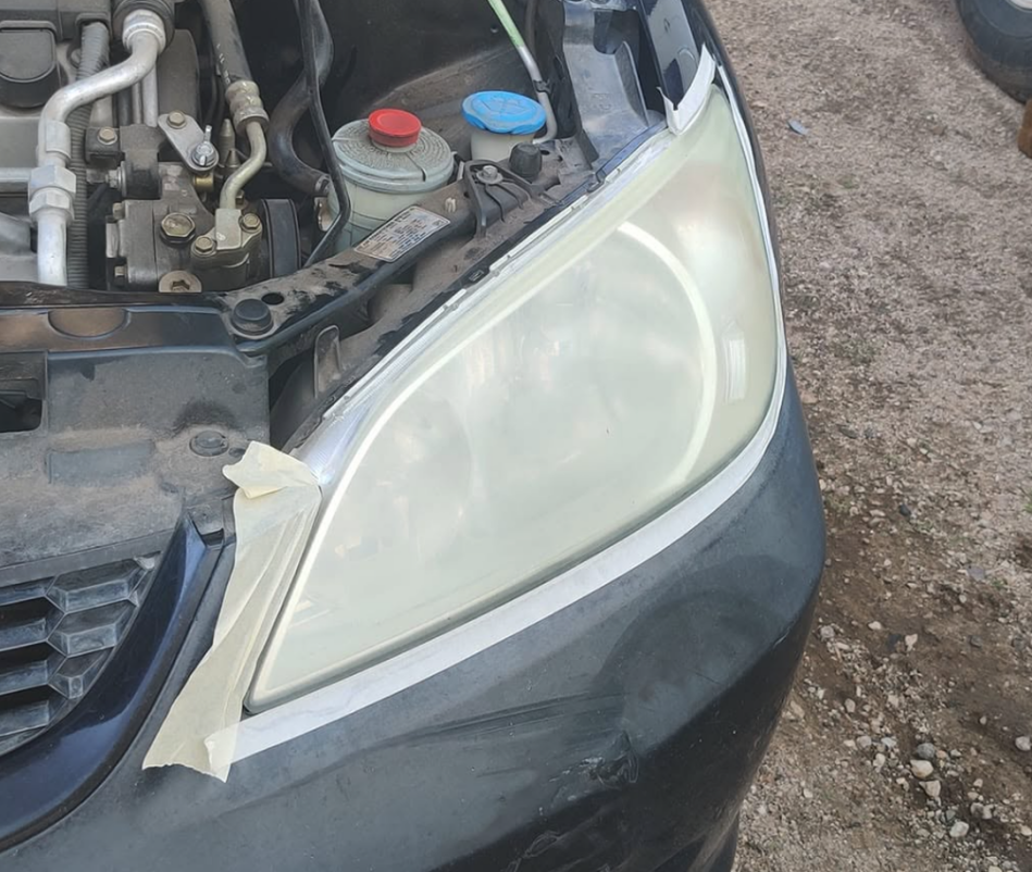 Oxidized foggy headlight before restoration