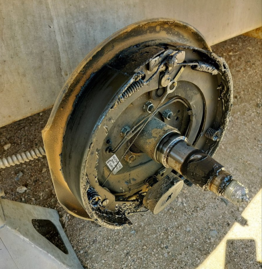 Unmaintained bearing and wheel seal failure — broken brake wires